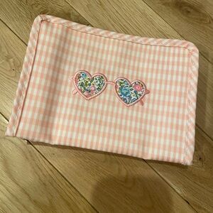 Small Trvl Roadie pouch featuring embroidery & Liberty fabric.